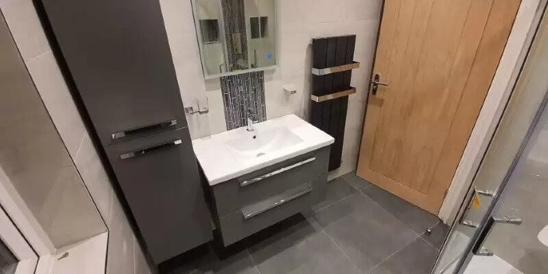 thin cabinet in small bathroom