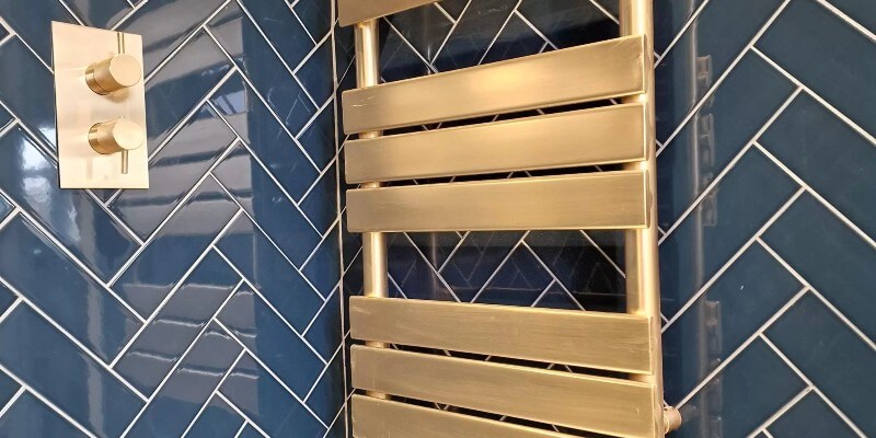 brass radiator in bathroom