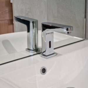 new tap in refurbed bathroom
