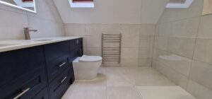 full view of shower enclosure and room