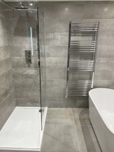 hanging-towel-rack-in-corby-bathroom-scaled